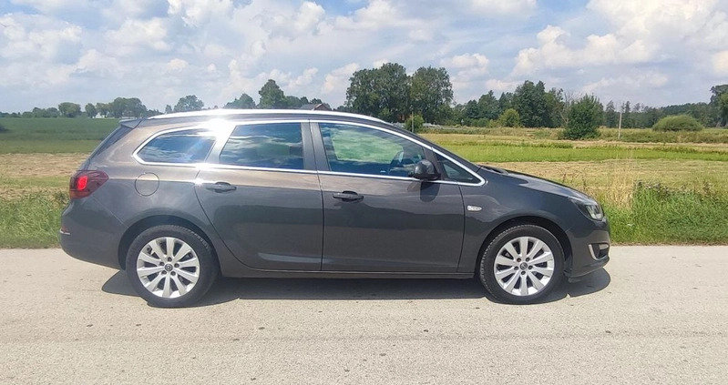 Opel Astra cena 26500 przebieg: 198500, rok produkcji 2014 z Miechów małe 211